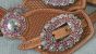 Custom spur straps light oil with pink oval buckles and conchos